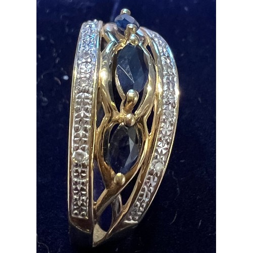 665 - A nine carat gold sapphire and diamond ring. Size O/P. Weight 2.4gm.