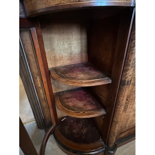 86 - A burr walnut inlaid credenza sideboard with curved glass doors to each side with two shelves. Centr... 