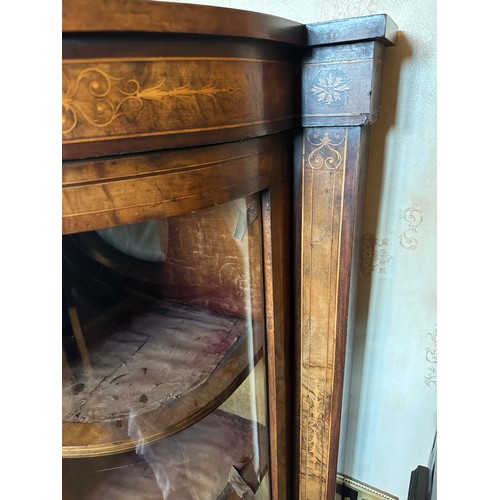 86 - A burr walnut inlaid credenza sideboard with curved glass doors to each side with two shelves. Centr... 