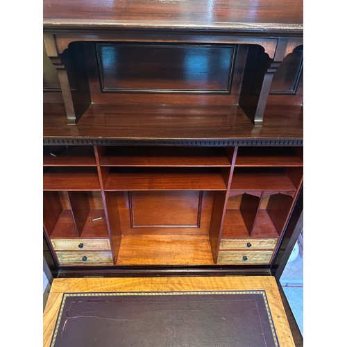 87 - A mahogany drop front writing desk with single drawer. Interior with compartments, four drawers with... 