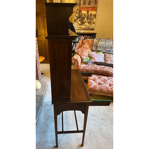 87 - A mahogany drop front writing desk with single drawer. Interior with compartments, four drawers with... 