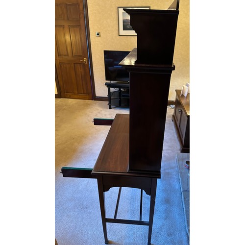 87 - A mahogany drop front writing desk with single drawer. Interior with compartments, four drawers with... 