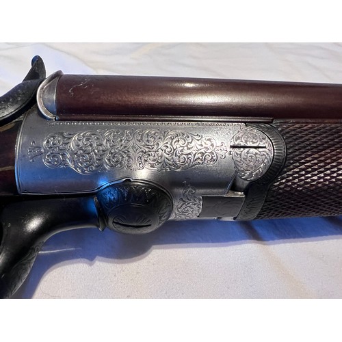 1245 - An Issac Hollis & Sons Pinfire D/B S/G. Late 19thC  with a Damascus barrel, nicely engraved. Both si... 