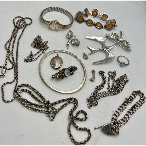 667 - A quantity of mainly .925 silver jewellery to include bangle, brooches, bracelet, Sekonda watch etc.