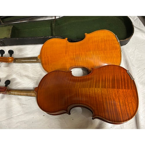 951 - A 19thC cased violin, no labels, back measures 37cm together with another violin and three bows.