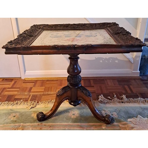 93 - A 19thC pedestal table, cross stitch embroidery to top with intricately carved frame. 61cm h x 60cm ... 