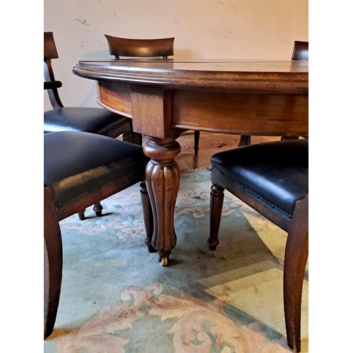 96 - A 19thC mahogany circular dining table 75cm h x 160cm w x 137cm d together with six bar back mahogan... 