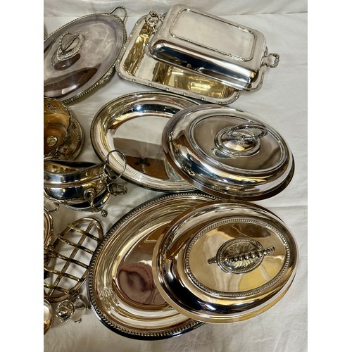 771 - A quantity of silver plate to include 5 lidded tureens, toast rack, wine coaster, nutcracker, Elking... 