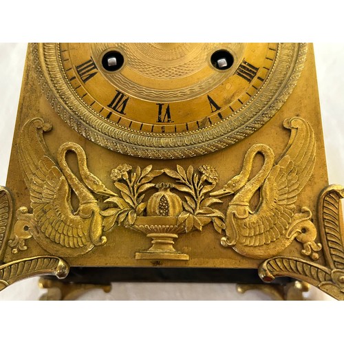 997 - A French gilt 19thC mantle clock 26cm h x 14cm h x 11cm deep. With key.