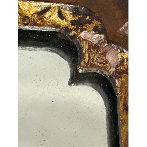 1025 - Two 19thC mahogany fretwork mirrors with the largest having a carved griffin at the top edge and she... 