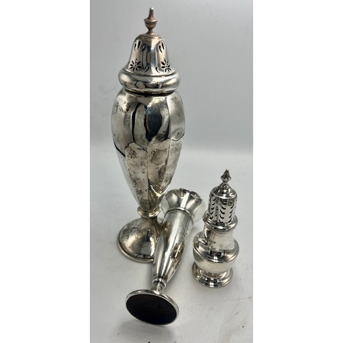 844 - Hallmarked silver to include vase, Victorian pepper pot and sugar shaker, various dates and makers. ... 