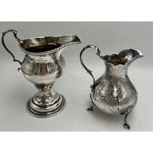 845 - Two hallmarked silver jugs, Sheffield 1912, maker Henry Stratford Ltd and London 1868, maker Richard... 