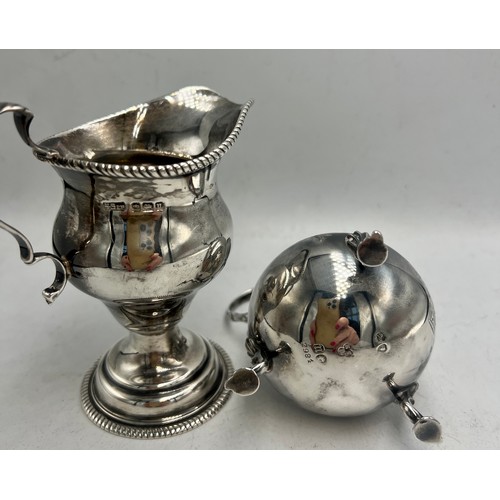 845 - Two hallmarked silver jugs, Sheffield 1912, maker Henry Stratford Ltd and London 1868, maker Richard... 