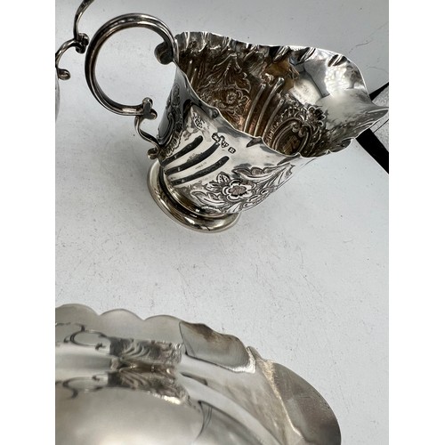 846 - Three hallmarked silver jugs. Total weight 224gm. Comprising Birmingham, date letter rubbed, London ... 