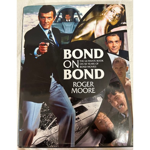 1077 - A collection of first edition James Bond 007 books comprising of 'Bond on Bond' with Roger Moore sig... 