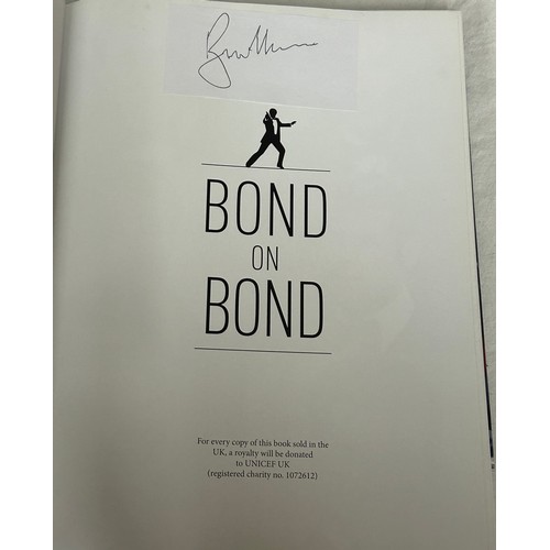 1077 - A collection of first edition James Bond 007 books comprising of 'Bond on Bond' with Roger Moore sig... 