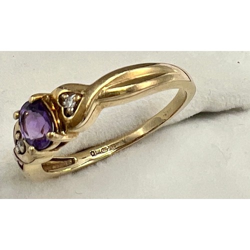 674 - A 9 carat gold amethyst and diamond set ring, size P. Weight 2.5gm.