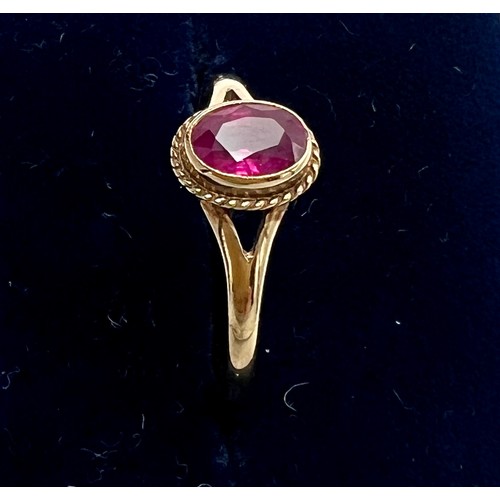 677 - A nine carat gold pink gem set ring. Size N. Weight 1.4gm.