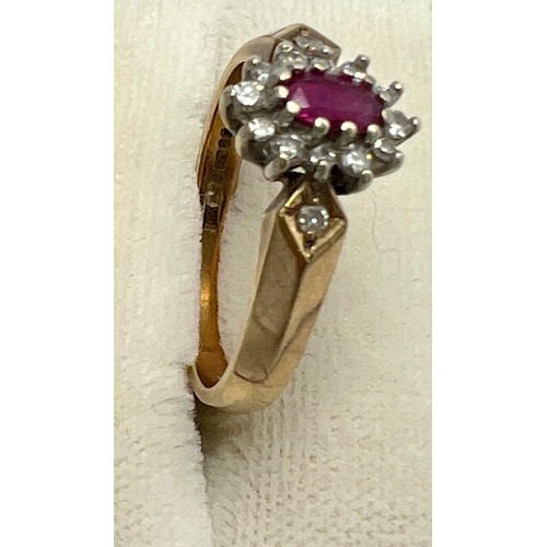 689 - A 9 carat gold cluster ring set with pink and clear stones. Size N. Weight 3gm.