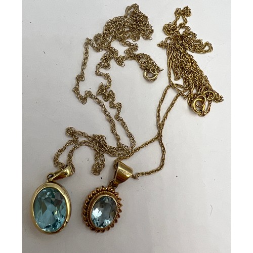 692 - Two 9 carat gold blue stone pendants. Chains 47cm l. Total weight 4.3gm.