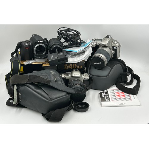 968 - Three cameras to include: Nikon D40 kit AF-S DX Zoom-Nikkor 18-55mm f/3.5-5.6G EDII in original box,... 