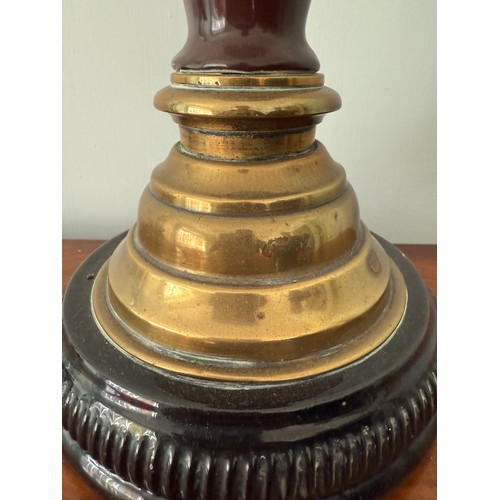 980 - Brass and ceramic oil lamp with silver mounts. 46cm h.