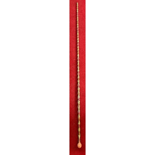 504 - A 19thC glass sugar bead filled walking cane. 144cm l.