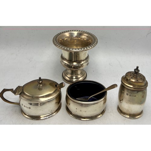 852 - Silver to include three piece cruet with spoons, Birmingham 1932 and .925 cup, 7cm h. Total weighabl... 