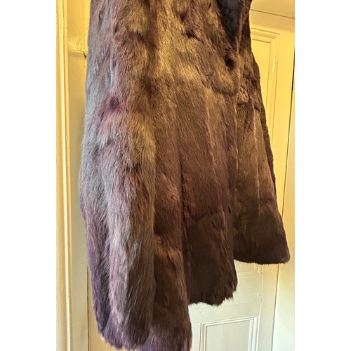 884 - A purple coney fur jacket by Betty Barclay, labelled 38. Shoulder to hem 77cm, underarm to underarm ... 