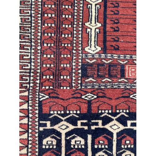 1105 - Two wool rugs. Red ground 150 x 96cm excl. tassels, blue ground 94 x 146cm excl. tassels.