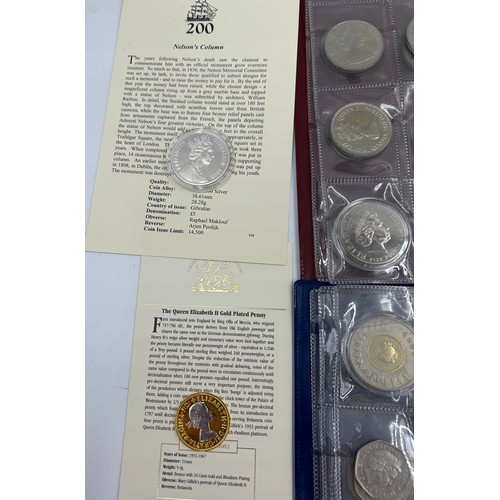 753 - Two albums containing a collection of commemorative coins including certificates for Replica Charles... 