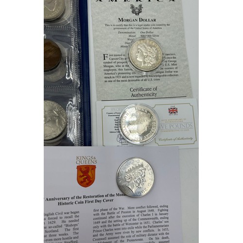 753 - Two albums containing a collection of commemorative coins including certificates for Replica Charles... 