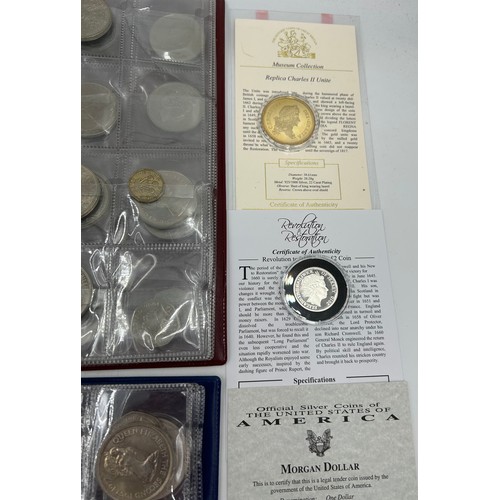 753 - Two albums containing a collection of commemorative coins including certificates for Replica Charles... 