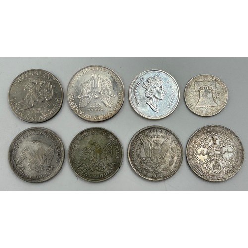 754 - Various silver coins to include 1963 Benjamin Franklin half dollar, 1990 Walking Liberty dollar, 199... 