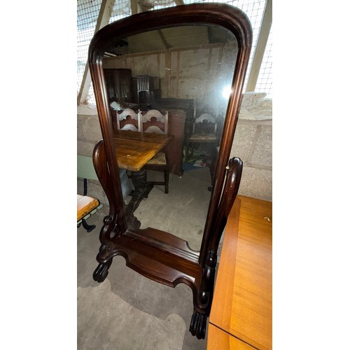 1031 - A mahogany framed cheval mirror. 148 h x 90cm w.