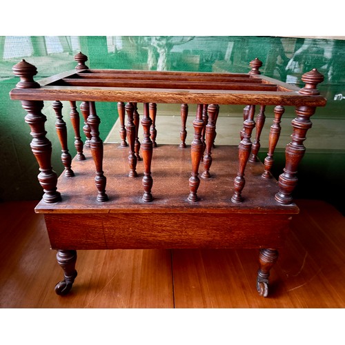 104 - An Edwardian mahogany canterbury on castors with single drawer to base. 53 w x 36 d x 48cm h.