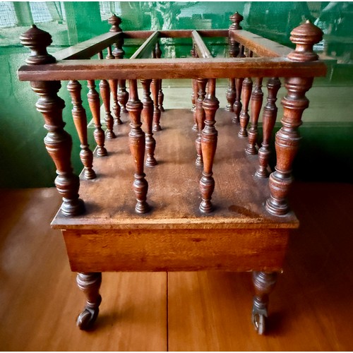 104 - An Edwardian mahogany canterbury on castors with single drawer to base. 53 w x 36 d x 48cm h.