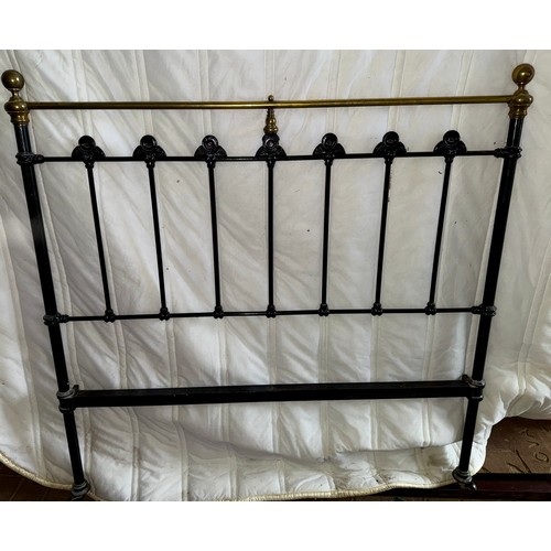 111 - A 19thC 4' 6'' double brass & iron bedstead with side irons and base.