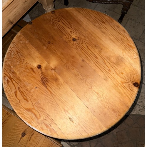 112 - Two pine tables, one circular 67 d x 69cm h and one oblong 86 x 50 x 46cm h.