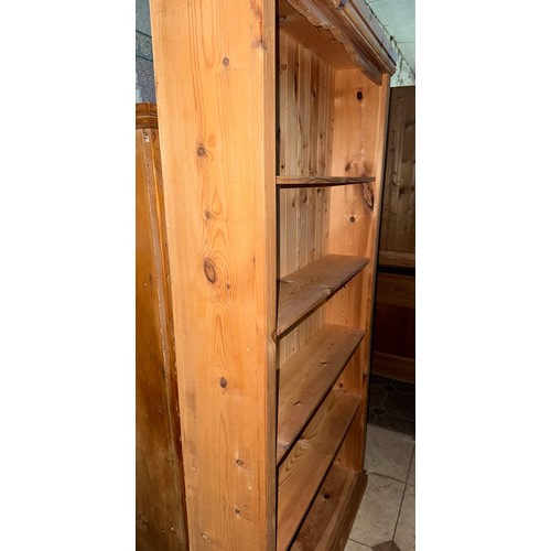 116 - A pine open bookcase with 5 shelves. 99 w x 23 d x 181cm h.