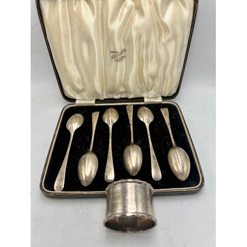 861 - A boxed set of six silver teaspoons, Birmingham 1929, together with a napkin ring Birmingham 1929. T... 