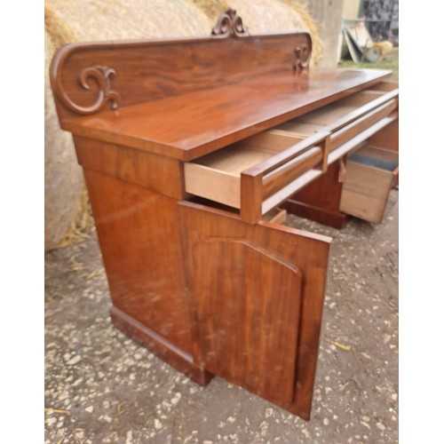 125 - A 19thC mahogany twin pedestal sideboard with three drawers over two cupboards, slides to one side a... 