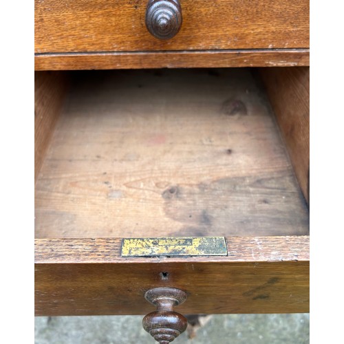 126 - A 19thC oak pedestal desk with tooled red leather top. 123cm w x 75cm h x 62cm d.