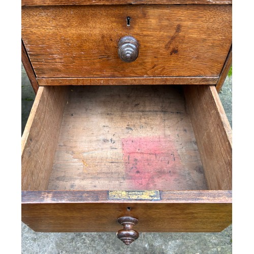 126 - A 19thC oak pedestal desk with tooled red leather top. 123cm w x 75cm h x 62cm d.