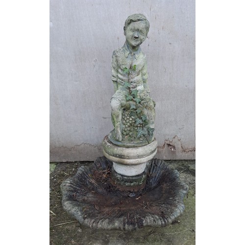 4 - A reconstituted stone figure of a boy sitting on a barrel. Fountain? 109 h x 160cm w.