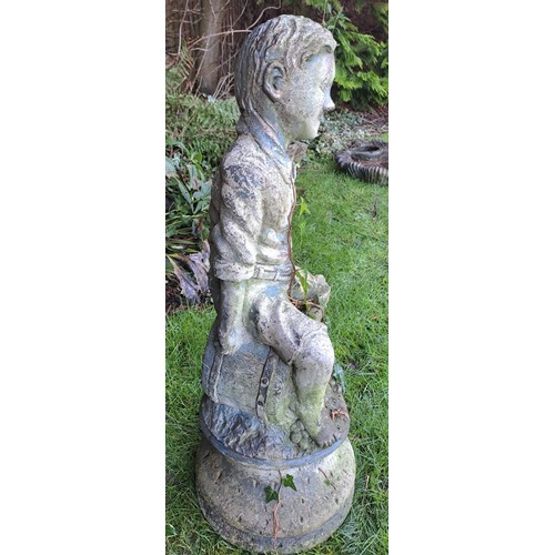 4 - A reconstituted stone figure of a boy sitting on a barrel. Fountain? 109 h x 160cm w.