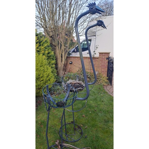 6 - Two metal bird garden planters. 186 h x 50 w x 55cm d.