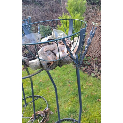 6 - Two metal bird garden planters. 186 h x 50 w x 55cm d.