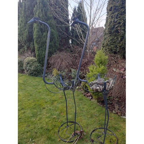 6 - Two metal bird garden planters. 186 h x 50 w x 55cm d.