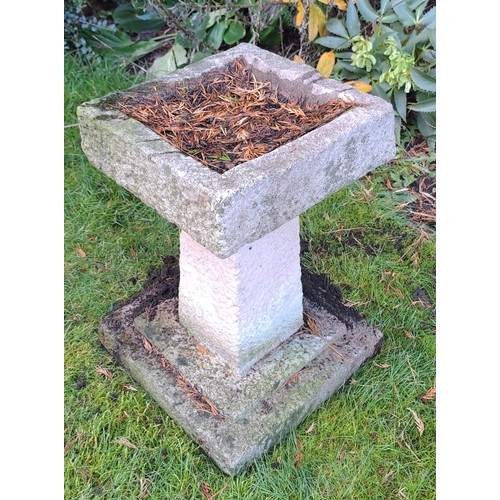 9 - A reconstituted square topped bird bath. 44 h x 32 w x 32cm d.